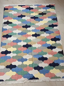 Flatweave Dhurrie in warm hues