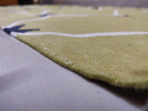 Flatweave dhurrie in olive green