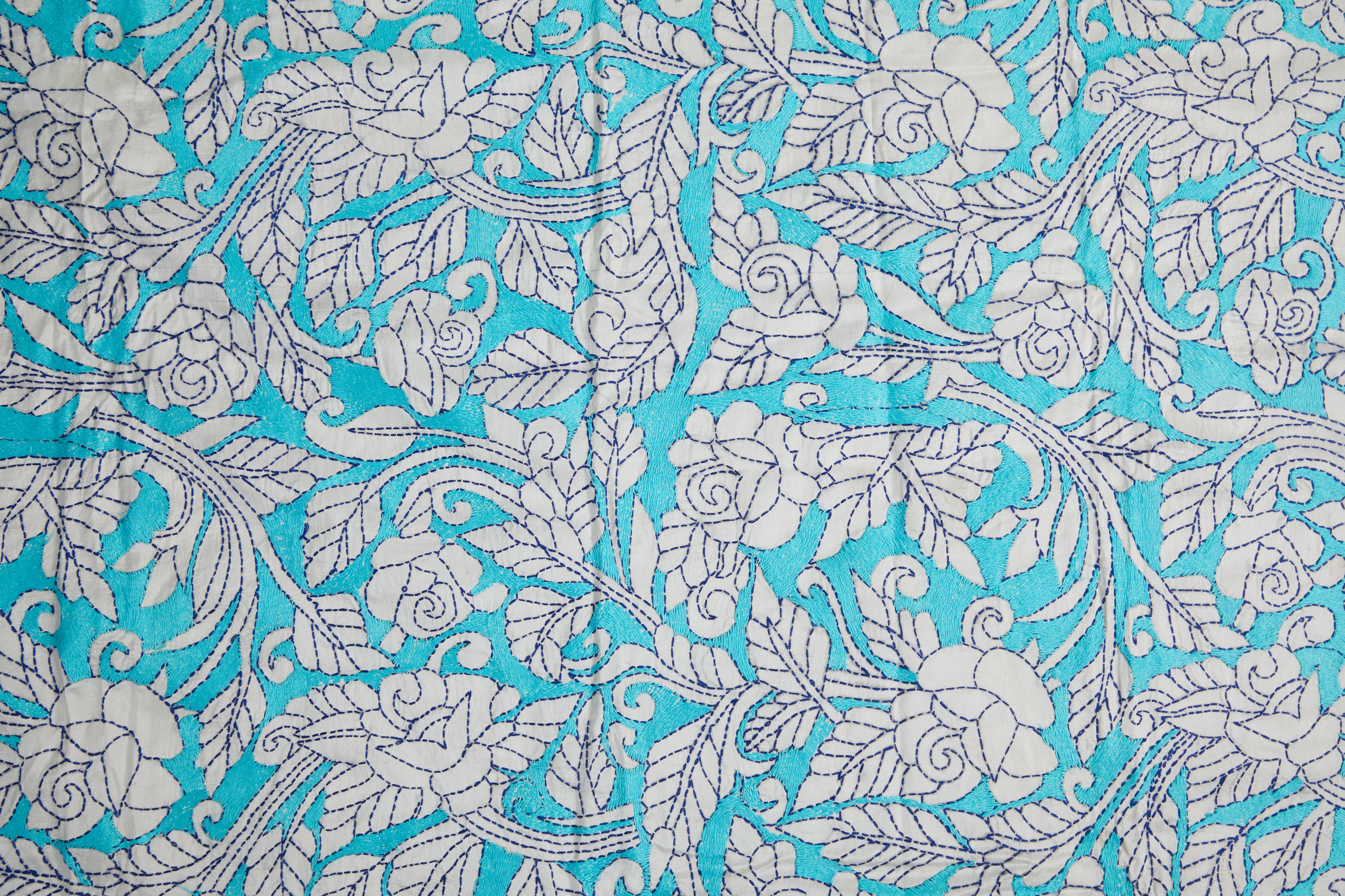 White Bangalore Silk with floral motifs in Reverse Kantha Blue Threadwork