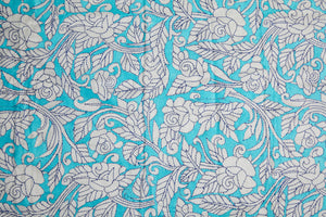 White Bangalore Silk with floral motifs in Reverse Kantha Blue Threadwork