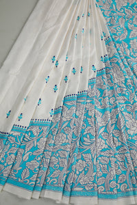 White Bangalore Silk with floral motifs in Reverse Kantha Blue Threadwork