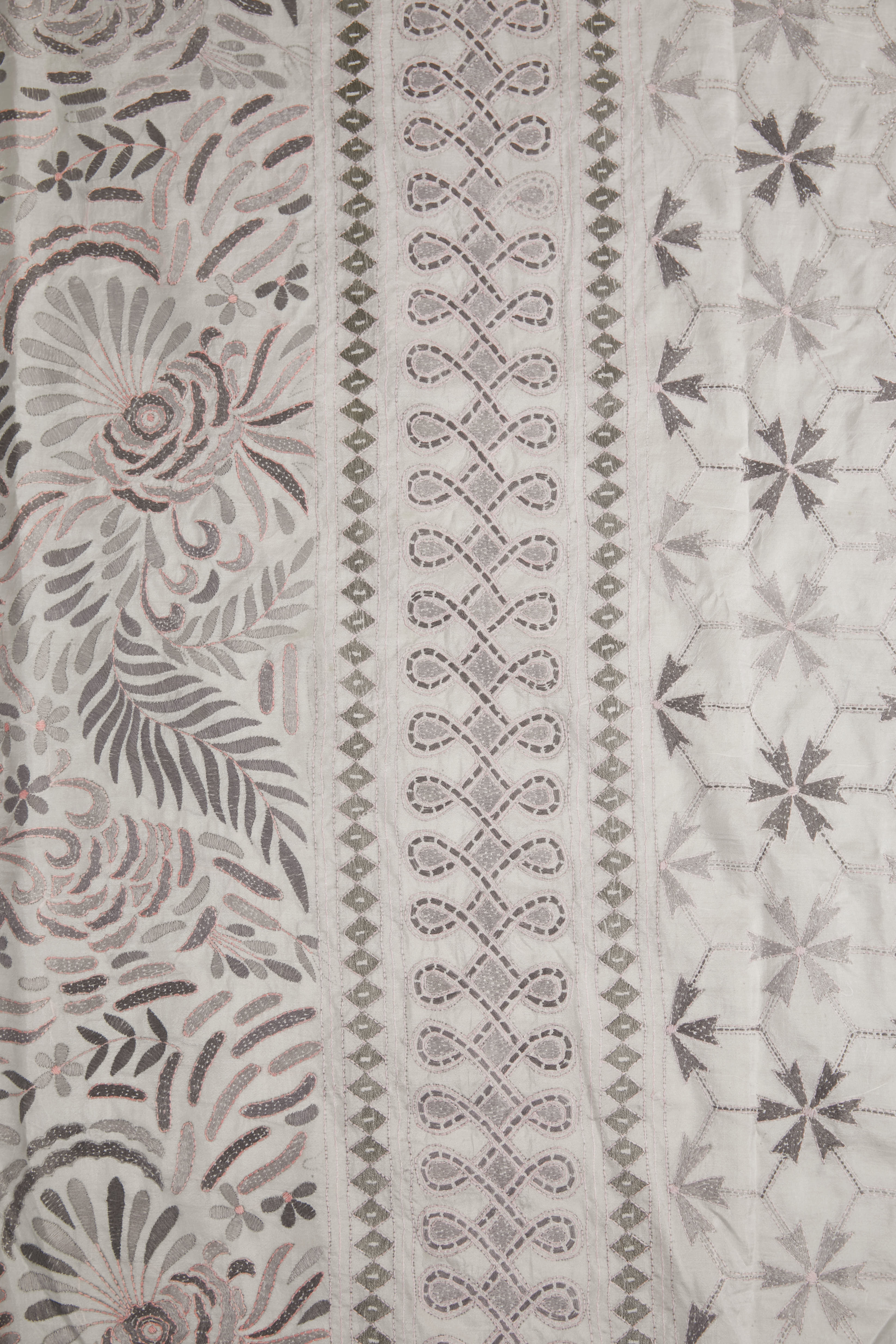 Soft White Bangalore Silk Saree in grey shades of nature-inspired motifs
