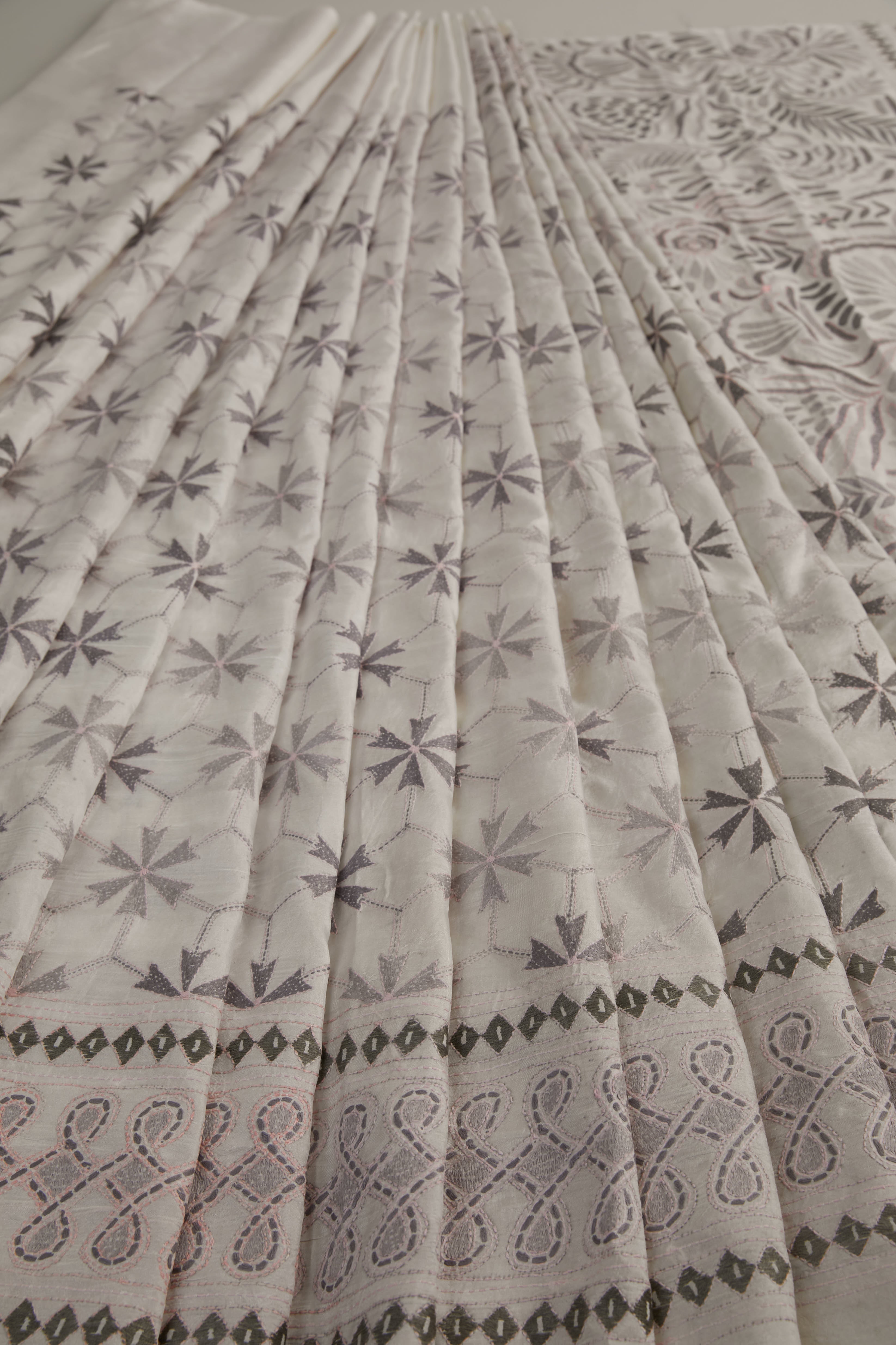 Soft White Bangalore Silk Saree in grey shades of nature-inspired motifs